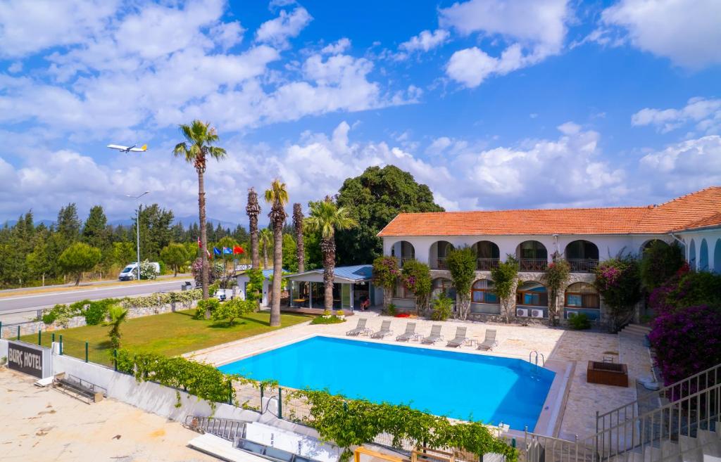 an aerial view of a resort with a swimming pool at BURÇ HOTEL in Dalaman