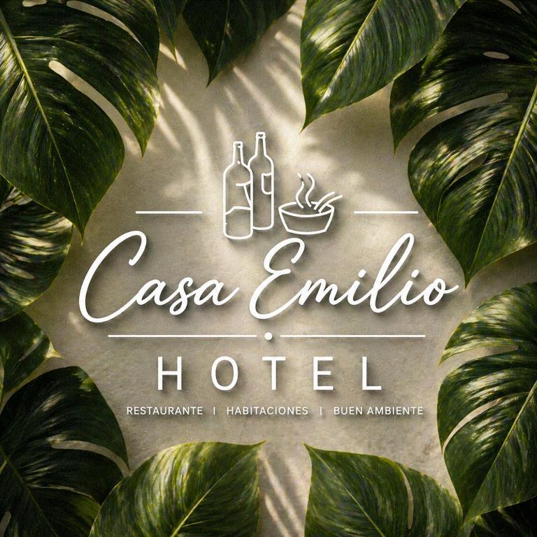 a sign for a casa emilia hotel with green leaves at Casa Emilio in Torre Baja