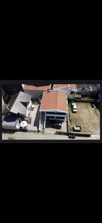 arial view of a building with a roof at Rastoder 2 in Donji Štoj