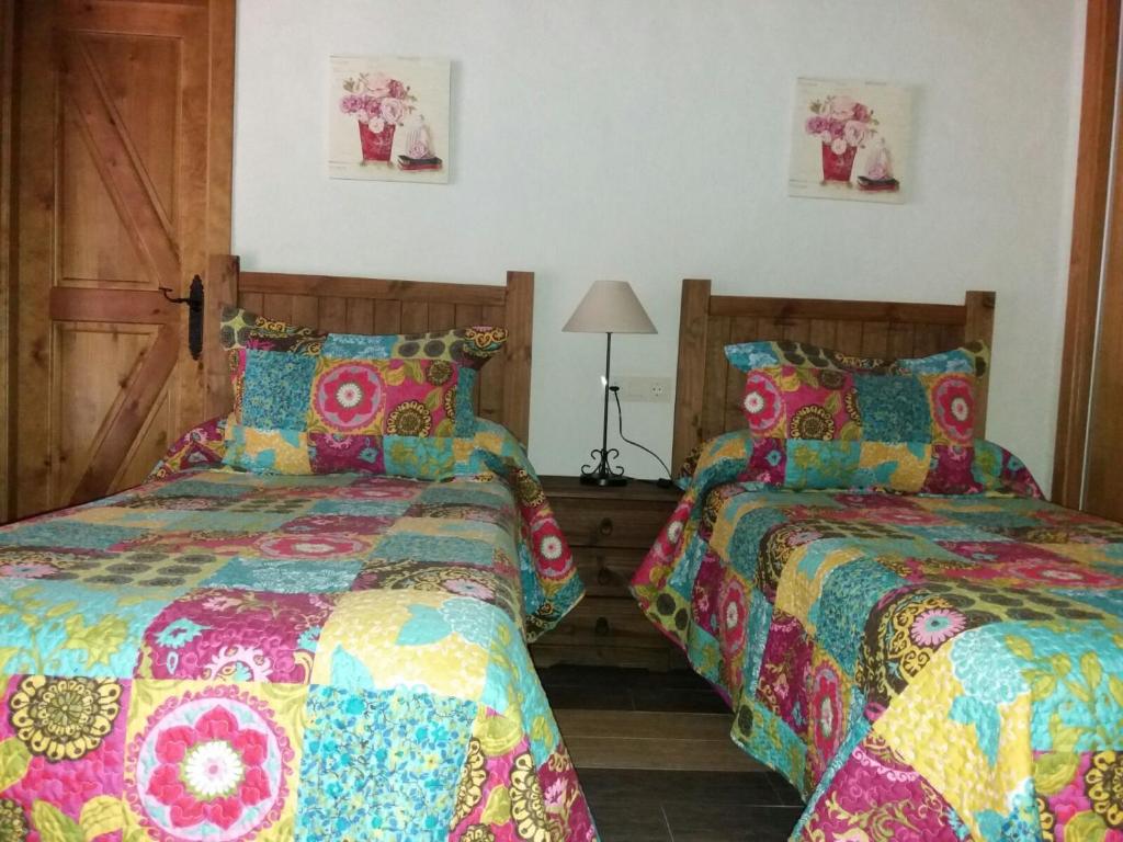 Postel nebo postele na pokoji v ubytování Virgen De Los Remedios