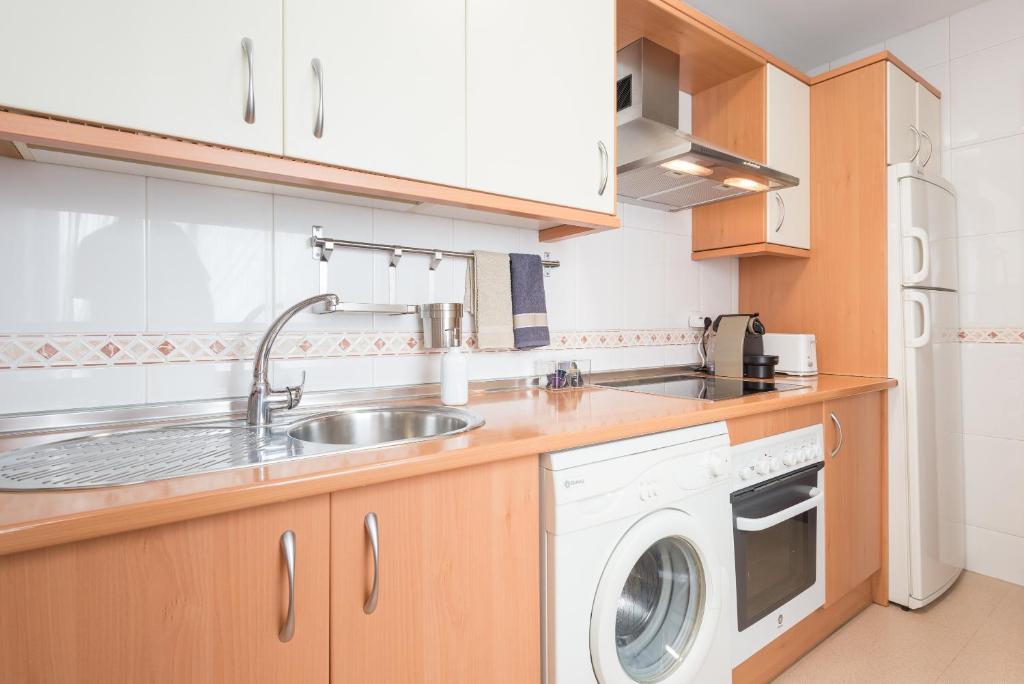 Kuchyň nebo kuchyňský kout v ubytování Colón12 Urban Apartment