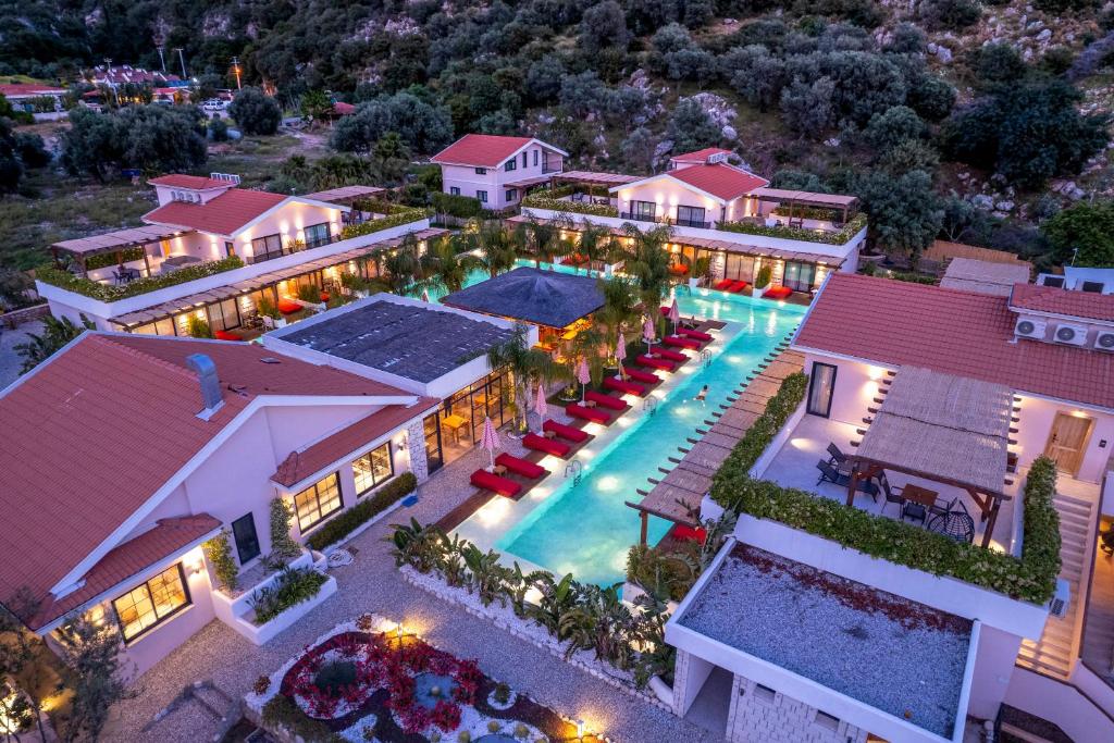 an aerial view of a house with a swimming pool at The Pearl Ölüdeniz in Oludeniz