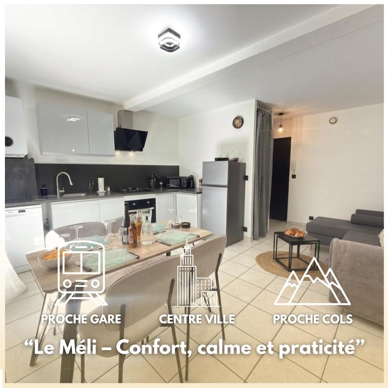 a kitchen and living room with a table and chairs at Le Méli Hyper Centre Proche Cols Stations in Saint-Jean-de-Maurienne