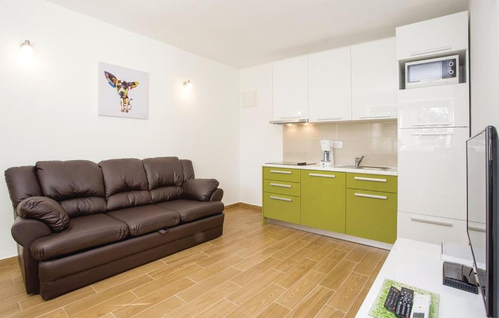 Kuchyňa alebo kuchynka v ubytovaní Apartman Prima