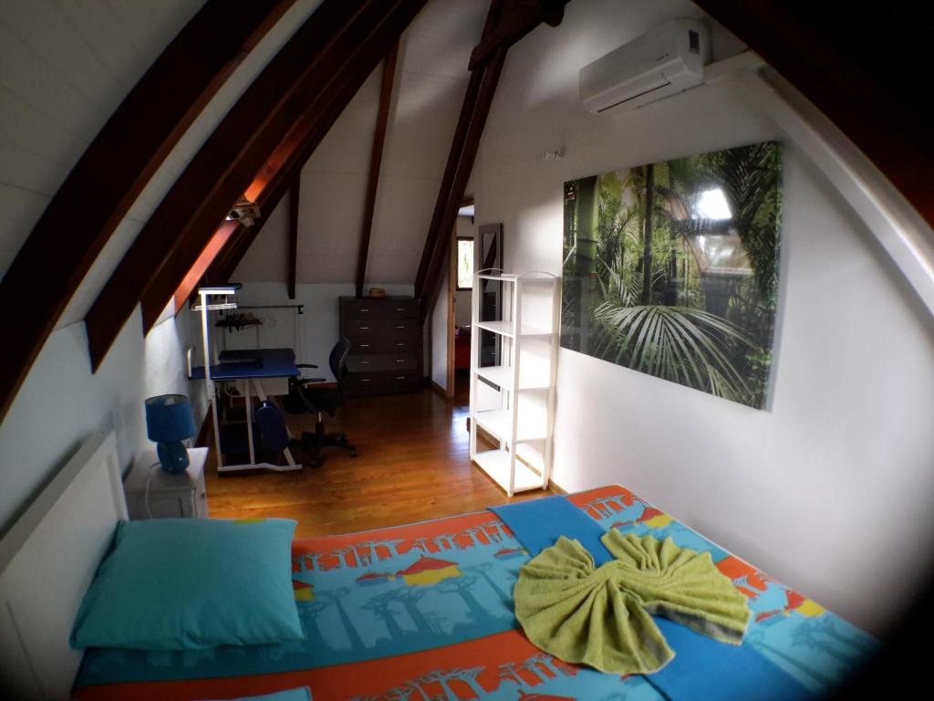 Postel nebo postele na pokoji v ubytování Appartement Les Bougainvilliers Vue Mer