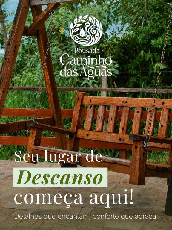 a sign for a park with a swing at Pousada Caminho das Aguas in Lindóia