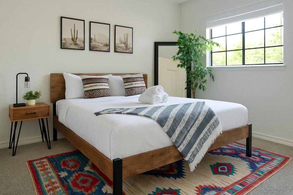 a bedroom with a large bed and a window at 102 Cecil Cir 3BR2 House in Calera