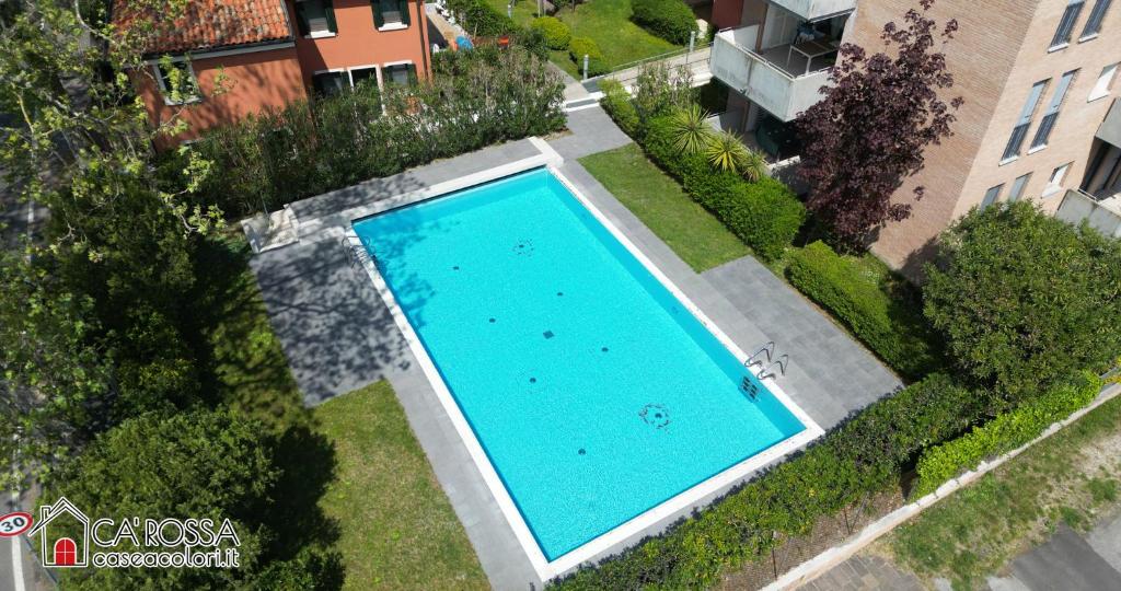 an overhead view of a swimming pool in a yard at Ca' Rossa Lido Venezia in Mestre