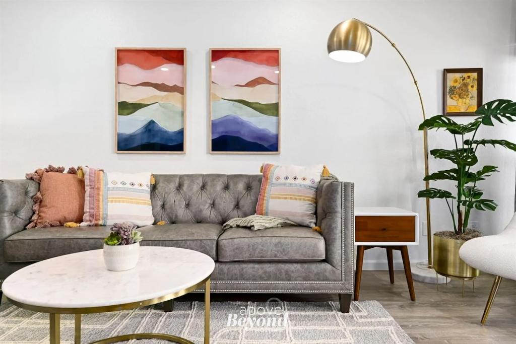 a living room with a couch and a table at Pets Stay Free, Breezy, Stylish Island Elegance in Lago Vista
