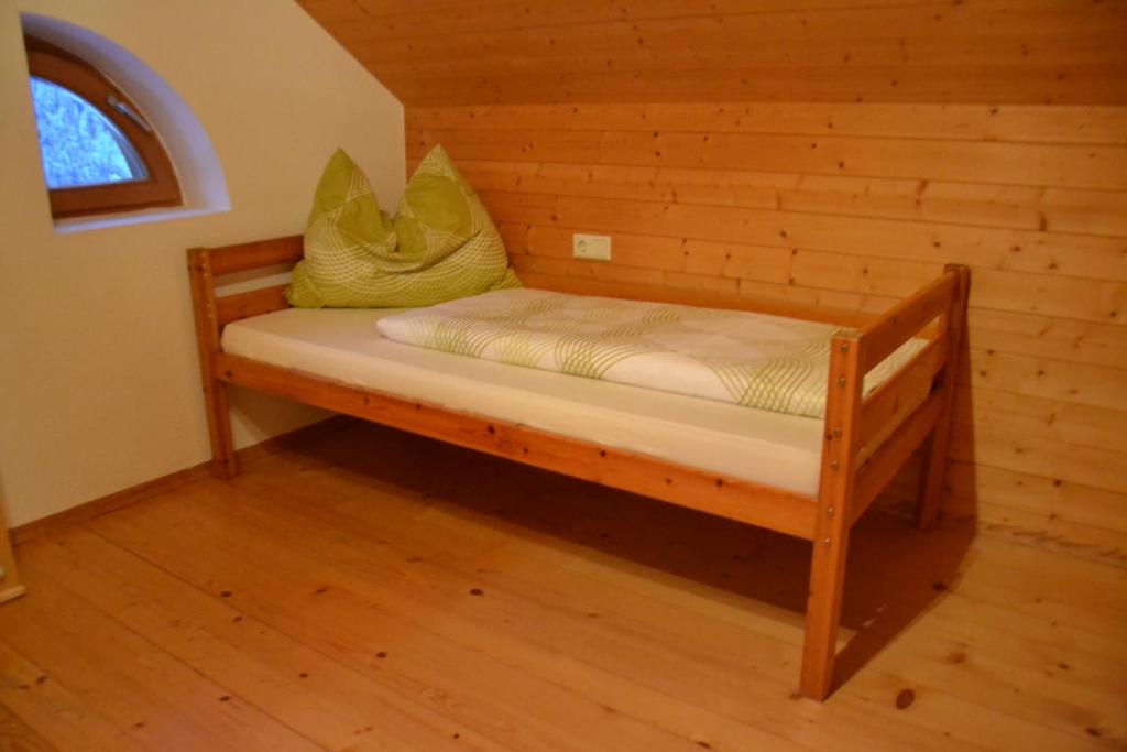 Posteľ alebo postele v izbe v ubytovaní Sunnaschi Appartements - Wohnungen oder gesamt als "Hütte"
