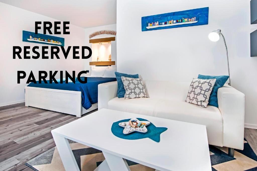a living room with a starfish on a coffee table at Studio Biritin- free parking in Rovinj