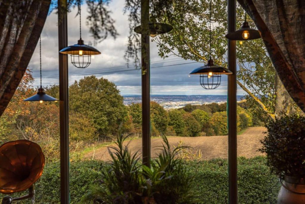 a view from a room with a window with lights at The Nest at The Woodmans in Whickham