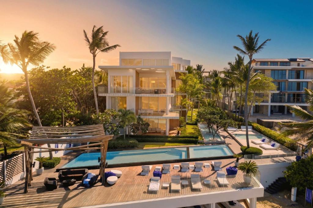 an aerial view of a resort with a swimming pool at Luxury 3BR Beachfront Private Pool Ultravioleta in Cabarete