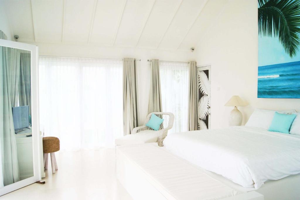 Postel nebo postele na pokoji v ubytování Harmony Villas