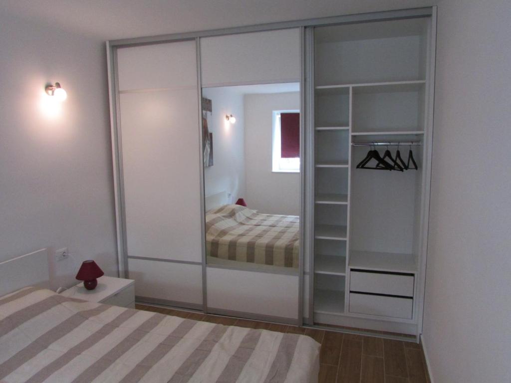 Posteľ alebo postele v izbe v ubytovaní Apartman Prima
