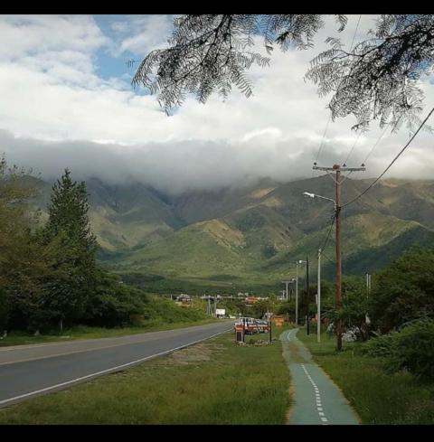 a road with a view of a mountain at Mostepa in Carpintería