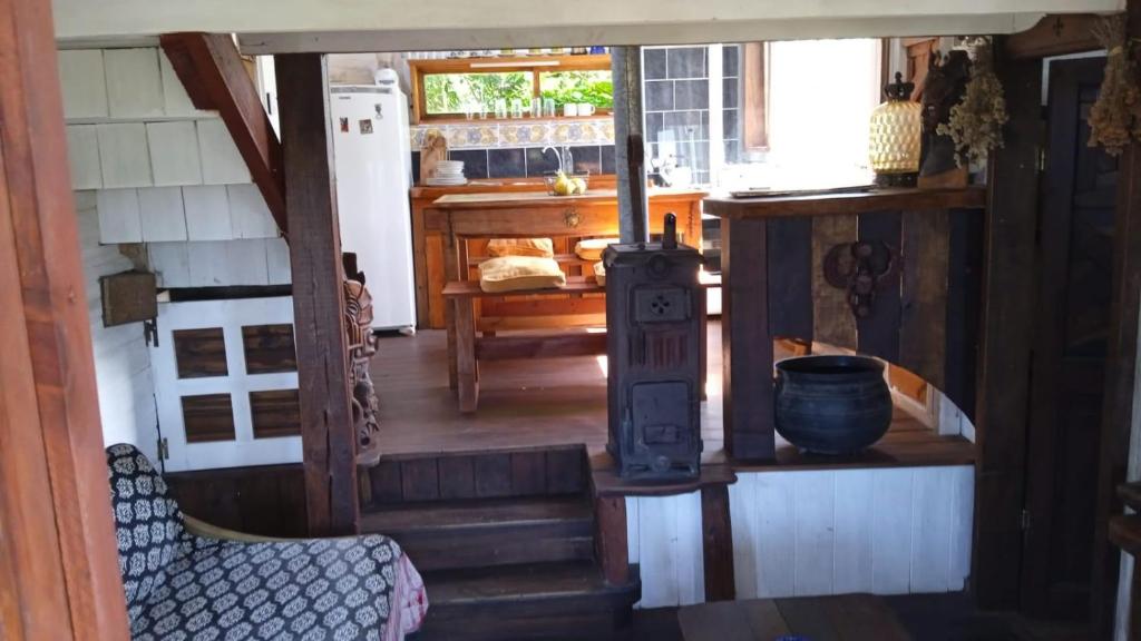 aoyer of a house with a wood stove in it at Dali in La Pedrera