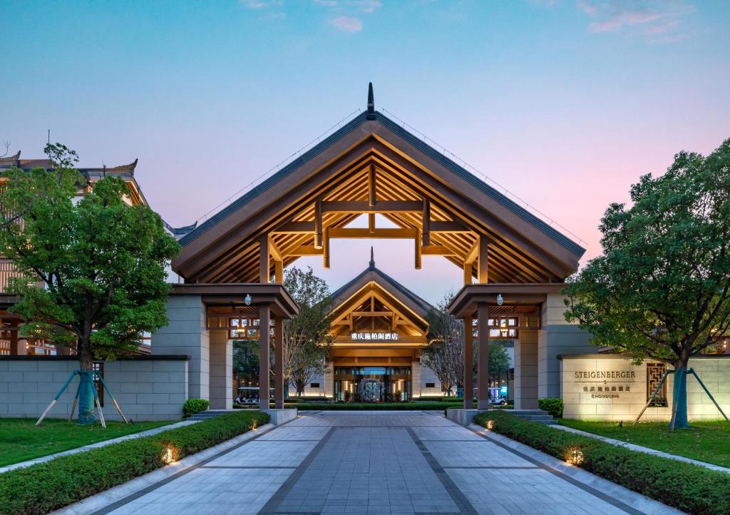 a large building with a wooden roof at Steigenberger Hotel Chongqing in Chongqing
