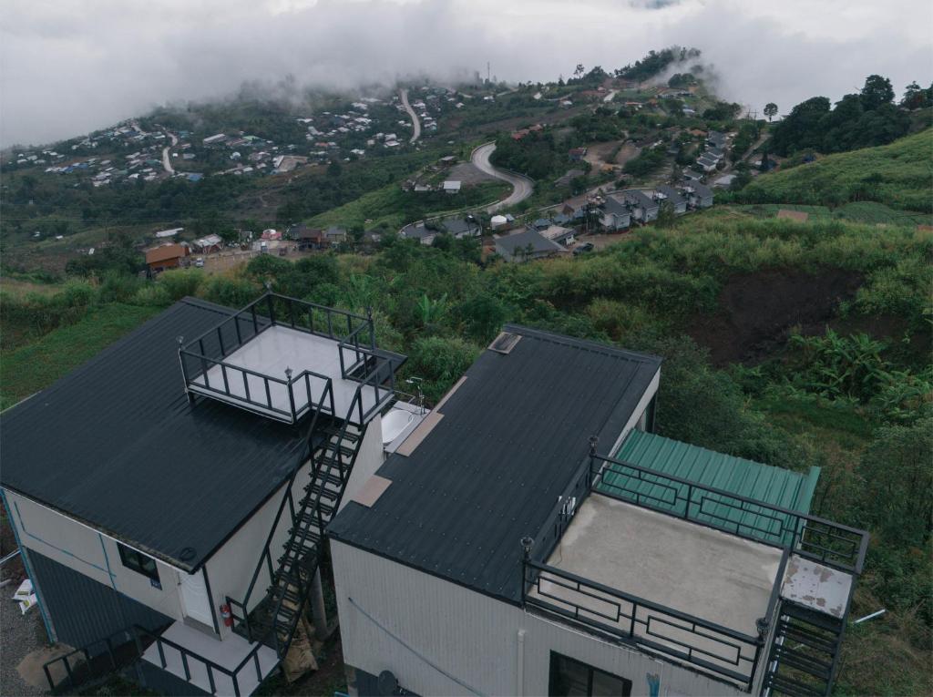 an aerial view of a house on a hill at สกายวันเดอร์ ภูทับเบิก in Ban Tha Kok Hai
