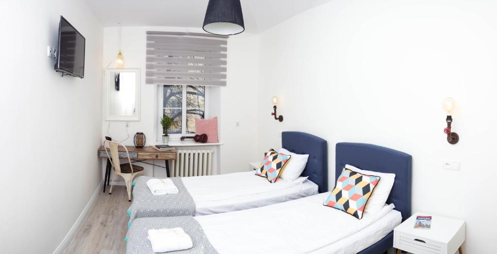 Postel nebo postele na pokoji v ubytování Chillout Hostel