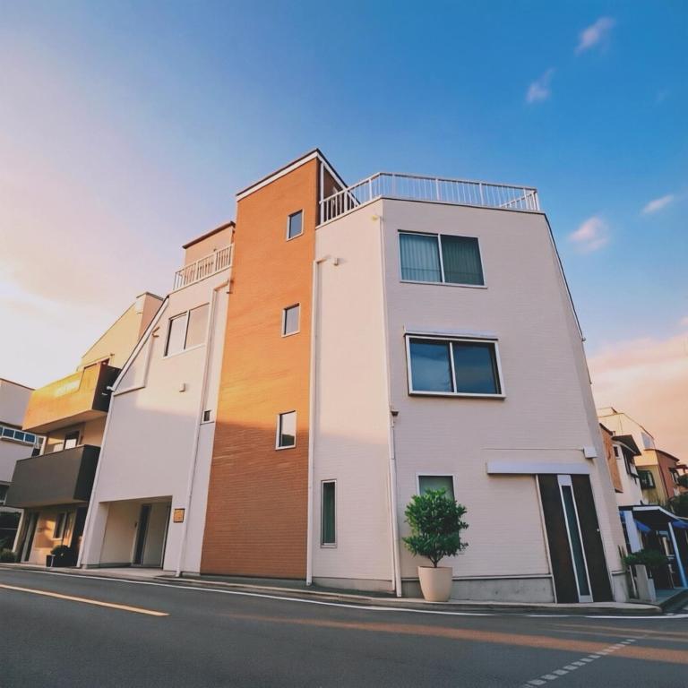 a building on the side of a street at Ueno 10minutes, Tokyo University 10minutes, three BR, three toilets, Max 10 people Free parking in Tokyo