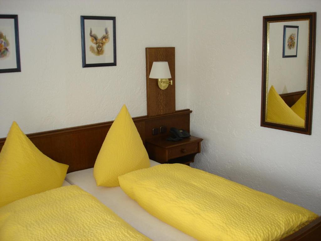 Postel nebo postele na pokoji v ubytování Pension Bergstub`n
