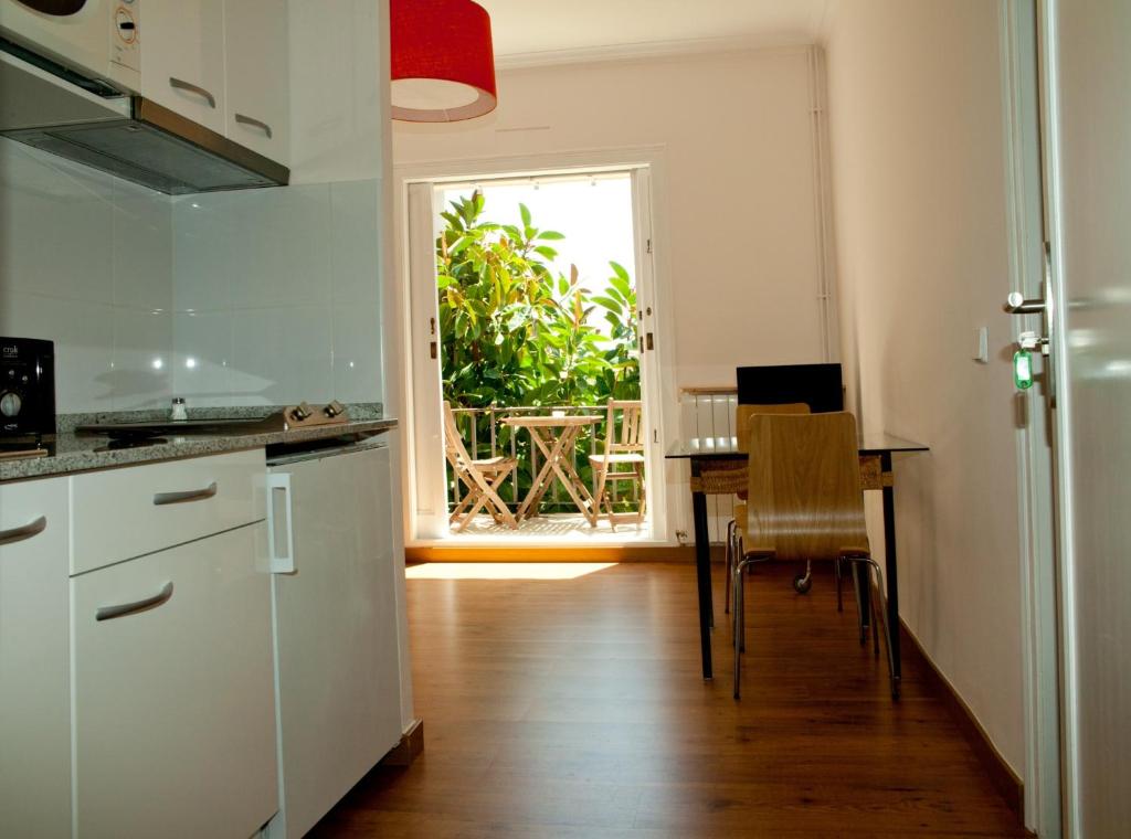 A kitchen or kitchenette at Tibidabo Apartments
