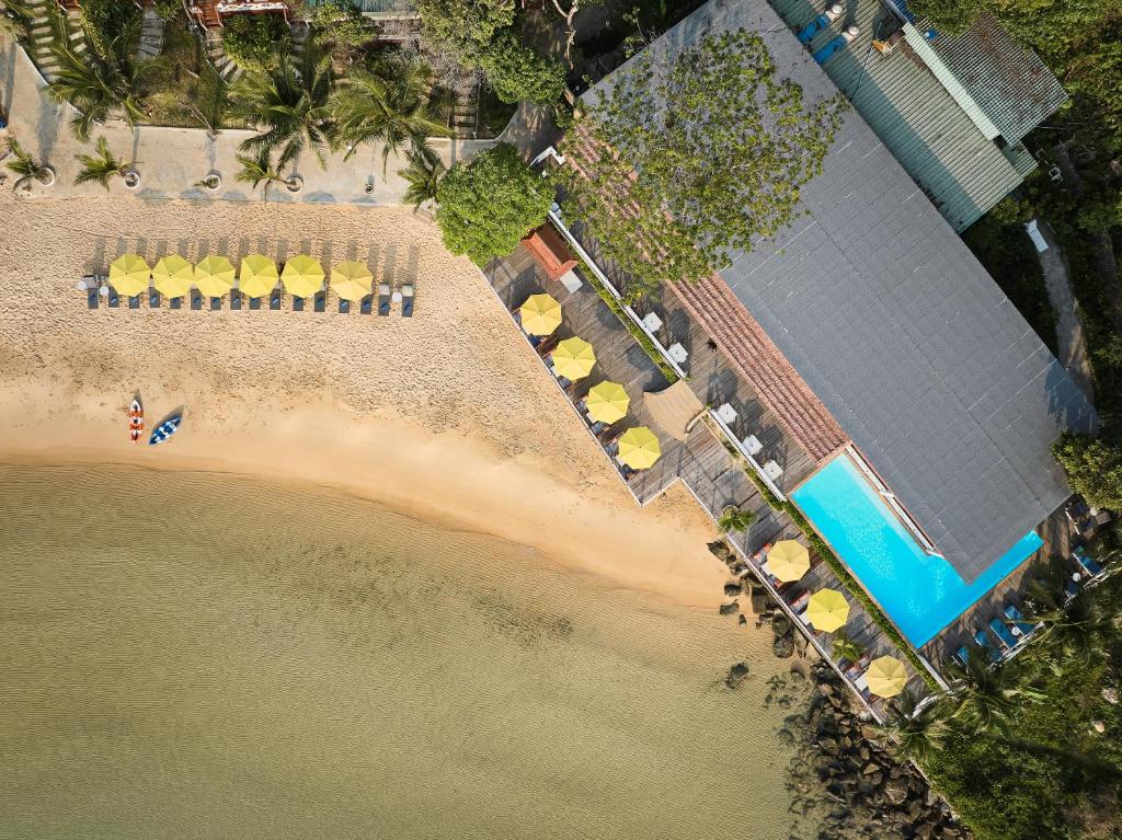 an overhead view of a beach and the water at One Beach Resort by EHM in Koh Rong Sanloem