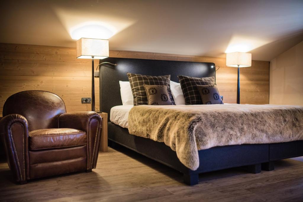 Posteľ alebo postele v izbe v ubytovaní Hotel Alù Mountain Design