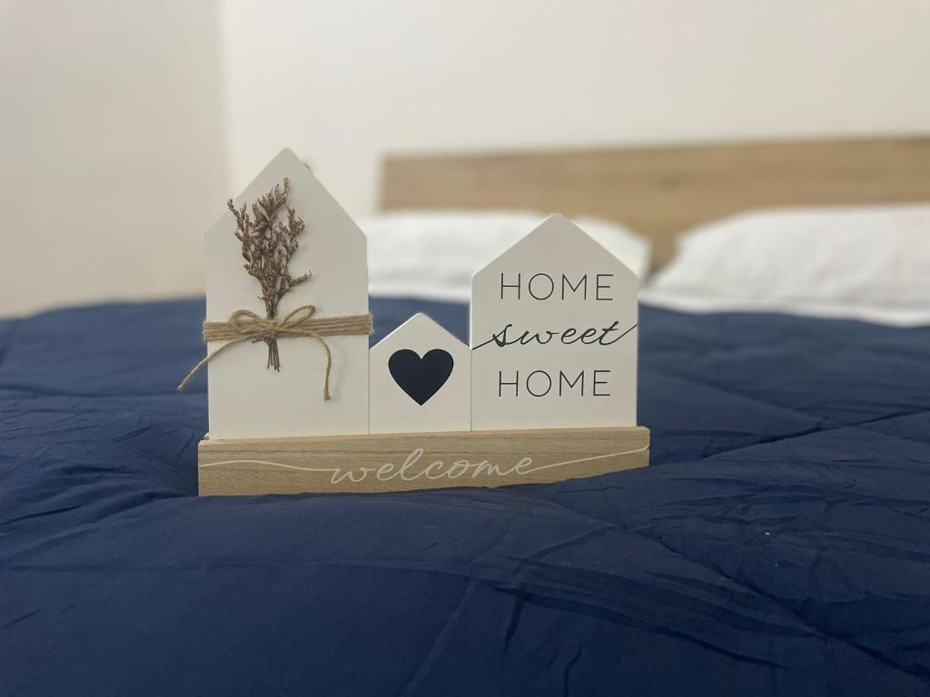 a couple of boxes sitting on top of a bed at La Casa di Lu & Li in Subiaco