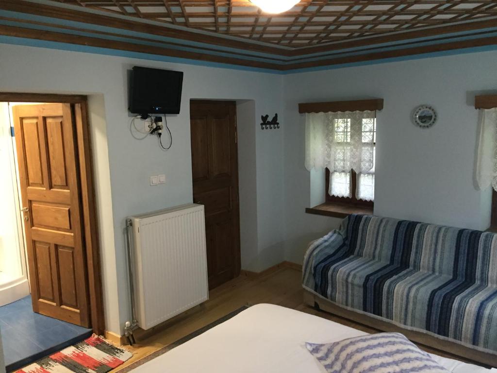 Postel nebo postele na pokoji v ubytování Elafotopos Hotel
