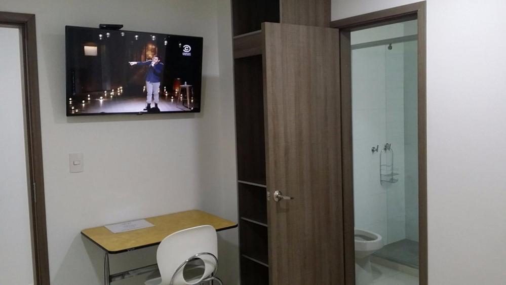 TV a/nebo společenská místnost v ubytování A Bogota On Holidays by Open - HOTEL CAS-EMBAJADA AMERICANA