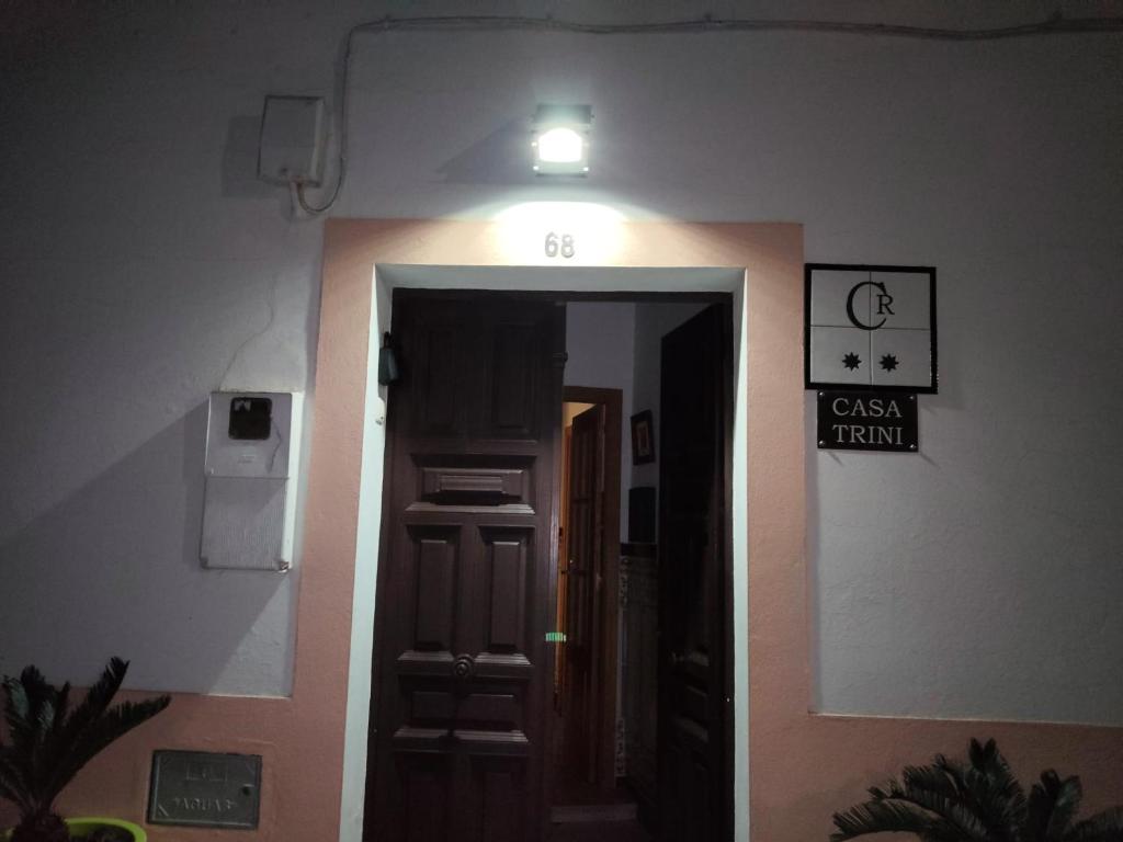 a room with a hallway with a light on the ceiling at Casa Trini in Torremegía