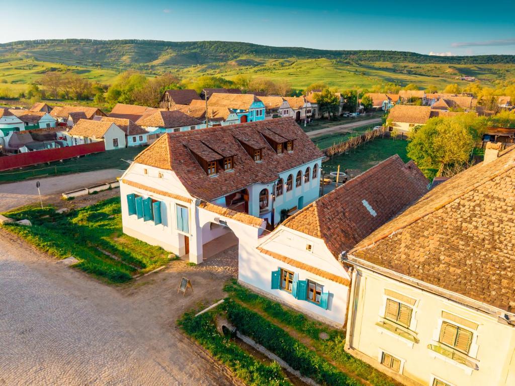 an overhead view of a small village with houses at Azuria Viscri in Viscri