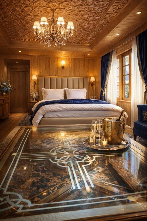 a bedroom with a bed and a chandelier at River Retreat Resort in Pahalgām