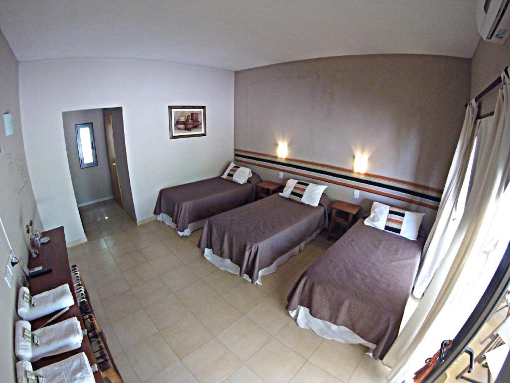 Postel nebo postele na pokoji v ubytování Las Cardas Posada