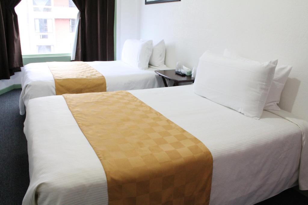 Postel nebo postele na pokoji v ubytování Union Hotel