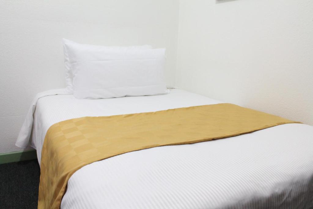 Postel nebo postele na pokoji v ubytování Union Hotel