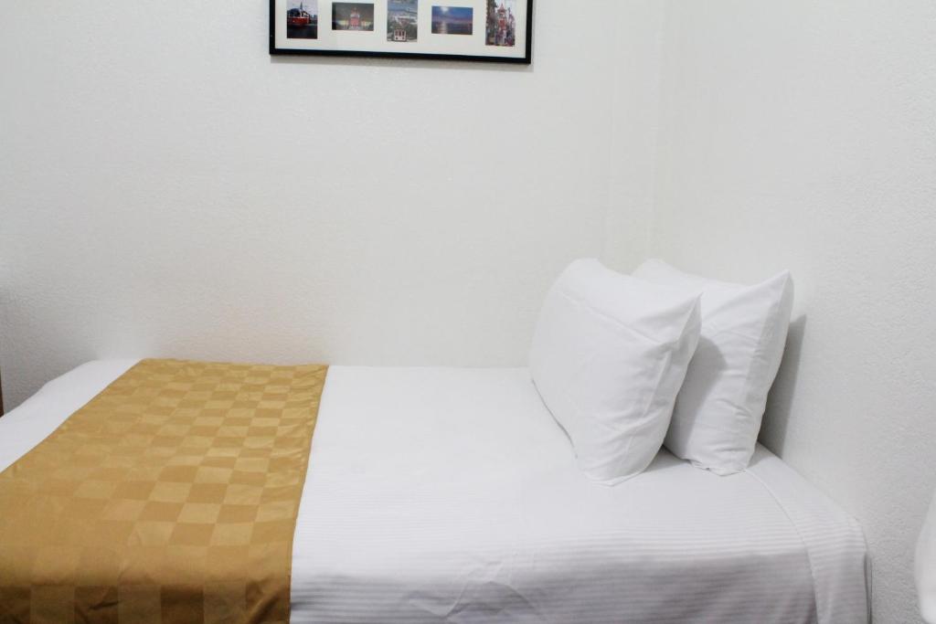 Postel nebo postele na pokoji v ubytování Union Hotel