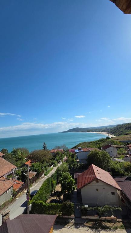 a view of the ocean from a building at Villa Nora in Albena