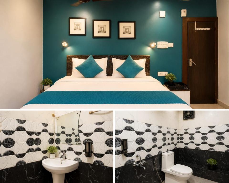 a bedroom with a bed and a bathroom with a sink at Hotel Sundari in Guwahati