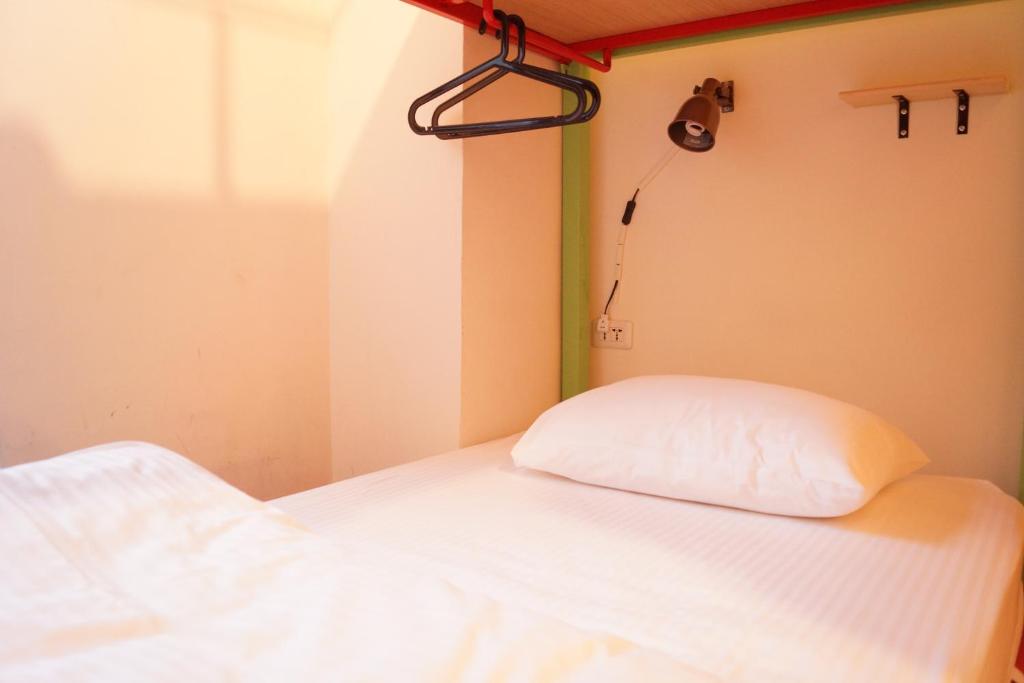 Postel nebo postele na pokoji v ubytování Trip GG Hostel