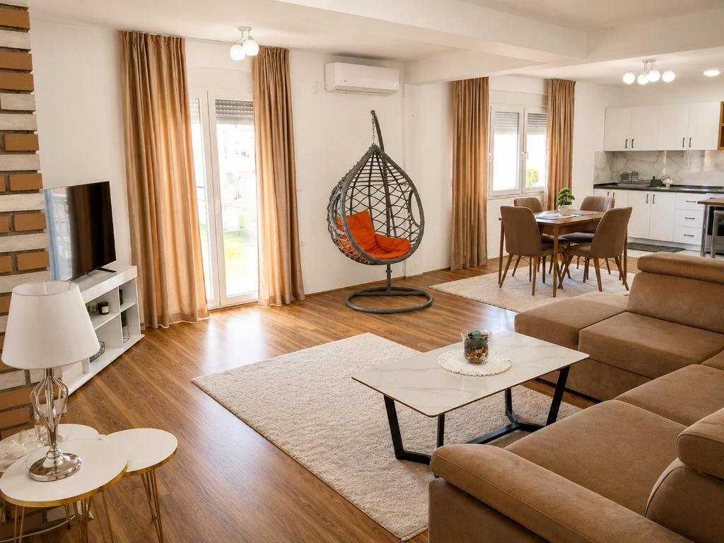 a living room with a couch and a table at Vila Elena in Gevgelija