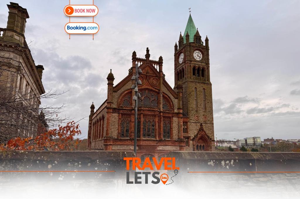 an old building with a clock tower in front of it at 2 Bedroom City Centre Apartment By Travel Lets Short Term Rental Agency Derry With Free WiFi in Derry Londonderry