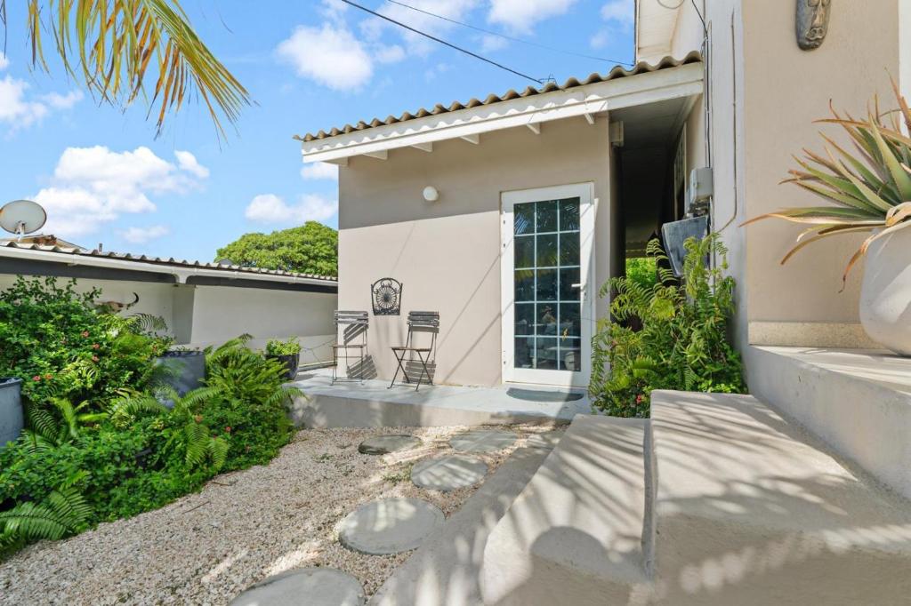 a villa with a view of a house at Mandavilla Apartment Curacao in Willemstad
