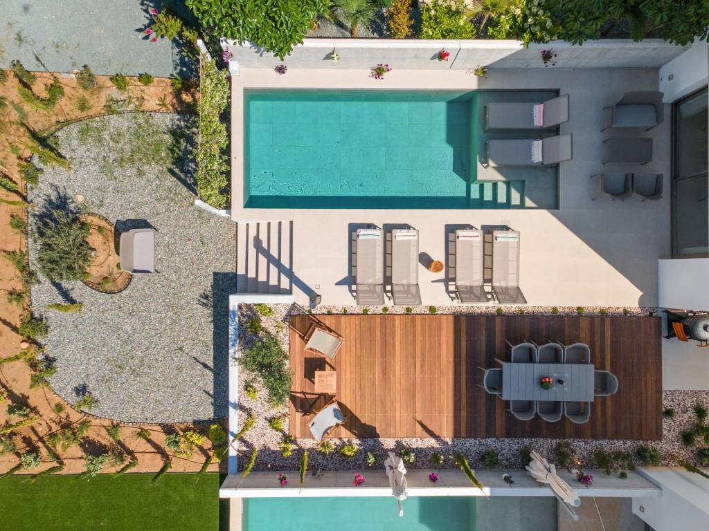 an overhead view of a house with a swimming pool at PANKI Beach Villa Protaras in Protaras