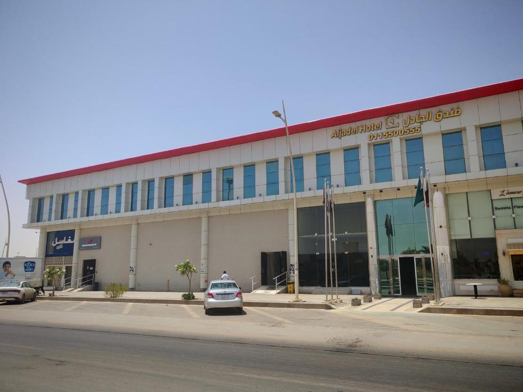 a car parked in front of a building at فندق الجادل Al Jadel Hotel in Al Kharj