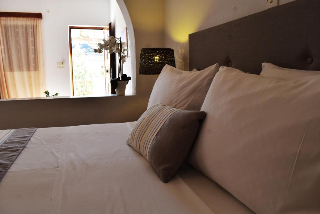 Postel nebo postele na pokoji v ubytování Astron Hotel