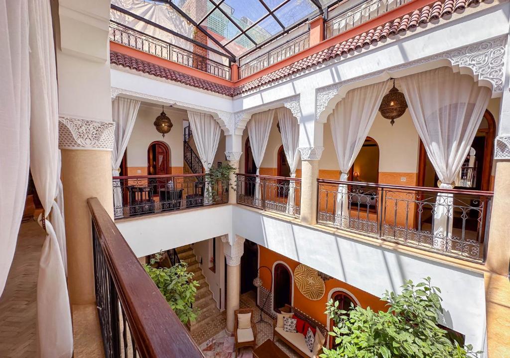 an image of a building with a glass ceiling at Riad Nirvana in Marrakesh