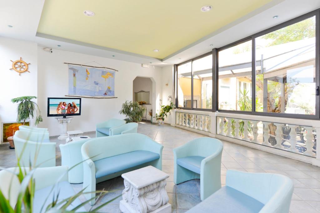TV a/nebo společenská místnost v ubytování Hotel Flora